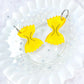 Glitter Jelly Bowtie Noodle Acrylic Earrings